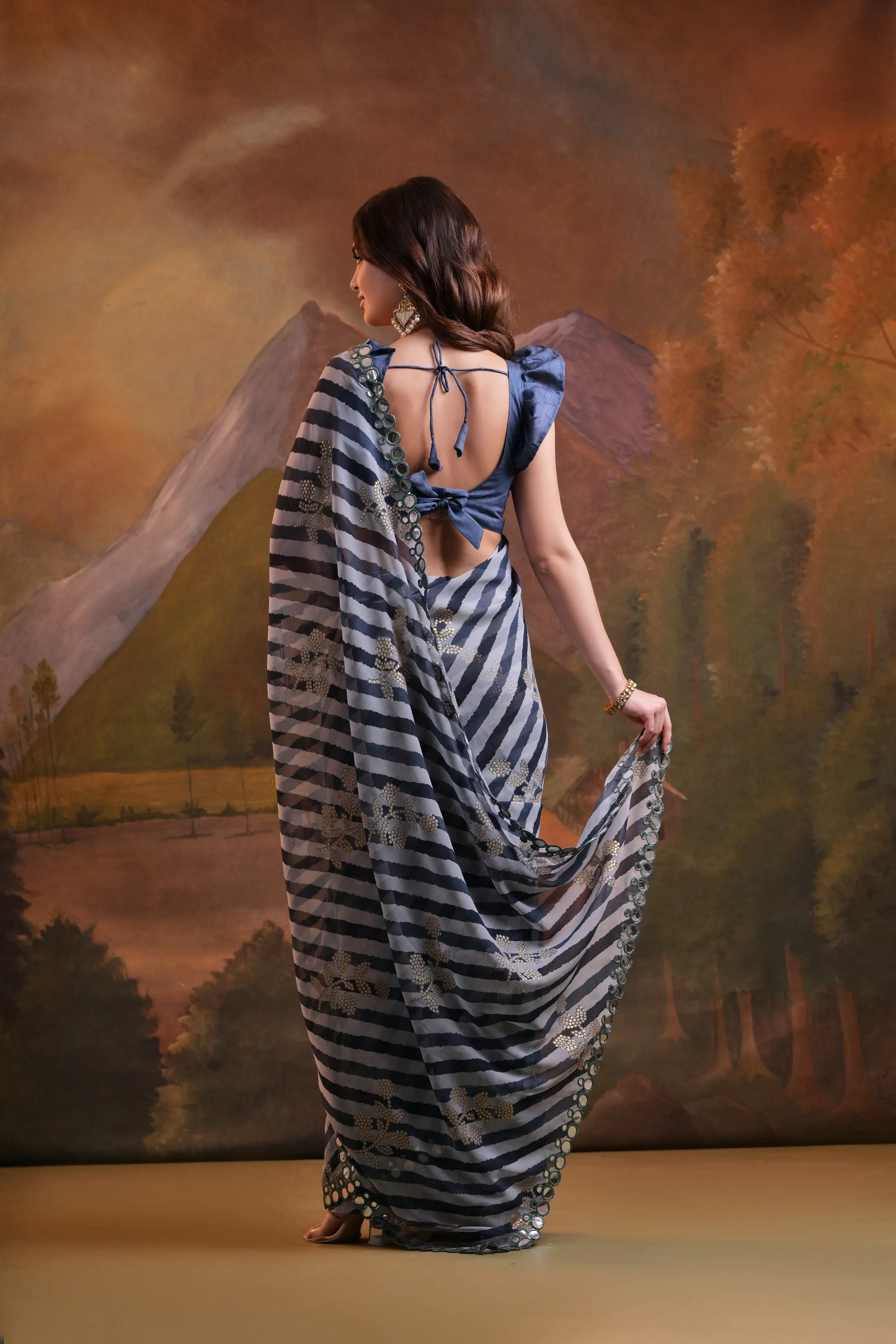 Women Party Wear Laheria Print Georgette Saree With Un Stitched Blouse